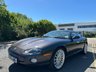 USED 2006 06 JAGUAR XKR 4.2 S Coupe 2dr Petrol Automatic (304 g/km, 400 bhp)-Rare Limited Edition XKR-S-Fantastic Low Mileage Example-2 Former Keepers-Last Keeper Since Aug 2011-Last Of The X100-White Badge-Finished In Copper Black Metallic-Heated Ivory Leather Upholstery-Recaro Sports Seats-Climate Control-20 Inch Split Rim Alloy Wheels-18 Services On File-Supplied New By Stratstone Jaguar Slough-Beautiful Example.The final run-out model was the S, which was available in four new colours in addition to the ones already on offer: Copper Black Metallic, Frost Blue Metallic, Bay Blue Metallic and Satin Silver Metallic. A revised white Jaguar Growler badge on the bonnet now featured chequered accents on either side. 