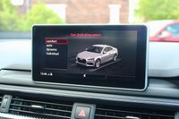 PRE-OWNED 2018 18 AUDI RS5 2.9 TFSI V6 Coupe 2dr Petrol Tiptronic quattro Euro 6 (s/s) (450 ps) Misano Red Pearl Effect (&pound;645 option), Fine Napa Leather Super Sports Seats Black With Rock Grey Stitching, 20in 5 Arm Trapezoid Forged Alloys (&pound;2000 option), Top Speed Increased To 184 MPH (&pound;1450 option), Carbon Inlays (&pound;950 option), Audi Side Assist Including Pre-sense Rear (&pound;775 option), Rear View Camera (&pound;450 option), Audi Phone Box With Wireless Charging (&pound;325 option), Tyre Pressure Monitoring System (&pound;250 option), Electric Adjustable Seats With Driver Memory (&pound;200 option), Storage Pack