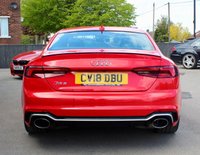 PRE-OWNED 2018 18 AUDI RS5 2.9 TFSI V6 Coupe 2dr Petrol Tiptronic quattro Euro 6 (s/s) (450 ps) Misano Red Pearl Effect (&pound;645 option), Fine Napa Leather Super Sports Seats Black With Rock Grey Stitching, 20in 5 Arm Trapezoid Forged Alloys (&pound;2000 option), Top Speed Increased To 184 MPH (&pound;1450 option), Carbon Inlays (&pound;950 option), Audi Side Assist Including Pre-sense Rear (&pound;775 option), Rear View Camera (&pound;450 option), Audi Phone Box With Wireless Charging (&pound;325 option), Tyre Pressure Monitoring System (&pound;250 option), Electric Adjustable Seats With Driver Memory (&pound;200 option), Storage Pack