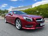 USED 2015 65 MERCEDES-BENZ SL 4.7 SL500 V8 AMG Sport Convertible 2dr Petrol G-Tronic+ Euro 6 (s/s) (455 ps)-Factory Extras Worth �&pound;3,025-STUNNING LOW MILEAGE EXAMPLE-FINISHED IN HYACINTH RED METALLIC WITH IVORY NAPPA LEATHER UPHOLSTERY-1 FORMER KEEPER-REVERSE CAMERA-ACTIVE PARK ASSIST-SPORTS STEERING WHEEL-AIR SCARF-HEATED SEATS-ROOF AMBIENT LIGHTING FUNCTION-ELECTRIC FOLDING MIRRORS-BLUETOOTH-CRUISE CONTROL-SATNAV-DAB RADIO-SPORTS SUSPENSION-AUTOMATIC HIGH BEAM CONTROL-19