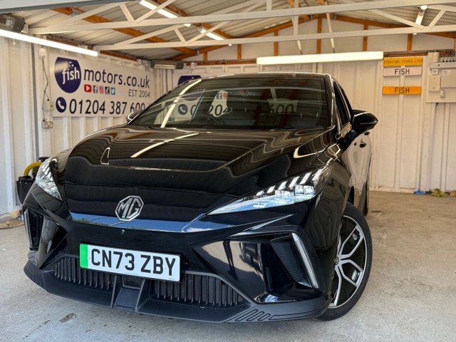 View our MG MG4 64kWh Trophy Long Range Hatchback 5dr Electric Auto (203 ps)+2 KEYS+2 CABLES+1 OWNER FROM NEW+HALF LEATHER SEATS+CLIMATE+CRUISE+NAVIGATION+BLUETOOTH+APPS+USB+DAB+