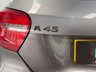 USED 2013 63 MERCEDES-BENZ A-CLASS 2.0 A45 AMG Hatchback 5dr Petrol SpdS DCT 4MATIC Euro 6 (s/s) (360 ps) LONG MOT, COMPRENEHSIVE SERVICE HISTORY, BODYKIT & SPOILER, PAN ROOF, HARMAN KARDON SOUND SYSTEM, HEATED SEATS, BLUETOOTH AUDIO AND TELEPHONE, MULTI-FUNCTION STEERING WHEEL, ELECTRIC FOLDING WING MIRORS, SAT NAV, AC, REVERSING CAMERA, FRONT & REAR PARKING SENSORS