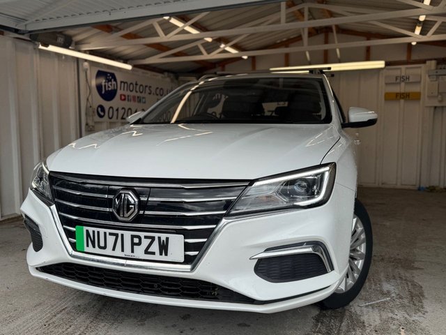 2021 71 MG MG5 52.5kWh Exclusive Estate 5dr Electric Auto (156 ps)+2 KEYS+2 CHARGE CABLES+HISTORY+MEDIA+SUNROOF+LEATHER SEATS+NAVIGATION+DIGITAL DASH+MEDIA+REVERSE CAMERA+ 2 KEYS+HISTORY+2 CABLES+SATNAV+FULL LEATHER HEATED SEATS+ALLOYS+APPLECARPLAY+REVERSE CAM+PARK SENSORS+CRUISE+HPI CLEAR