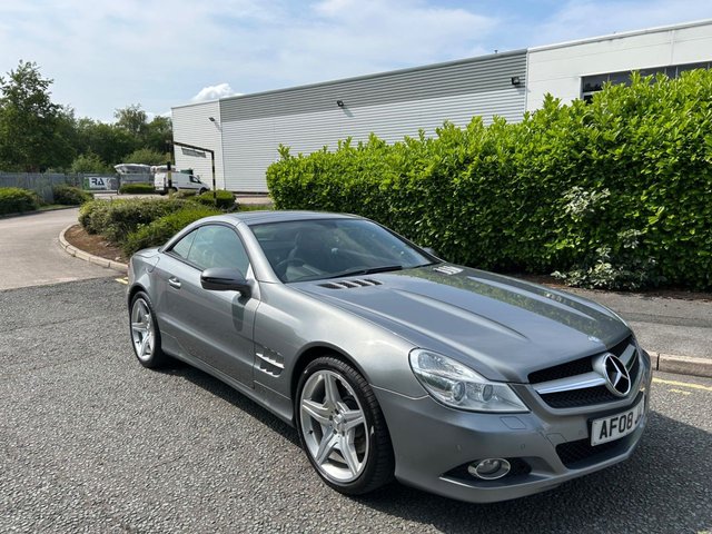 2008 08 Mercedes-Benz Sl 3.5 SL350 Convertible 2dr Petrol 7G-Tronic (236 g/km, 315 bhp)-2 Former Keepers-Last Keeper Since Feb 2018-Finished In Palladium Silver Metallic-Heated Black Leather Upholstery-Glass Panoramic Roof-19 Inch 5 Spoke Alloy Wheels-Mfsw-Satnav-Dual Climate Control-Cruise Control-Bluetooth-Front & Rear Parking Sensors-Airscarf-9 Services On File-Wonderful Low Mileage.Great Opportunity.