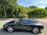USED 2010 10 PORSCHE 911 3.8 997 Carrera S Coupe 2dr Petrol PDK (240 g/km, 385 bhp)-Price Range Gen 2 Carrera S-Finished In Basalt Black Metallic With Heated Black Leather Upholstery-Sports Exhaust System-Sport Chrono Package Plus-Cruise Control-19 Inch Sport Design Wheels-Sports Seats-Porsche Crest Embossed On Head Restraints-Rear Wiper-Climate Control-Satnav-Bluetooth-Rear Park Assist-Fantastic Example With Top Specification. 
