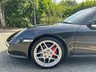 USED 2010 10 PORSCHE 911 3.8 997 Carrera S Coupe 2dr Petrol PDK (240 g/km, 385 bhp)-Price Range Gen 2 Carrera S-Finished In Basalt Black Metallic With Heated Black Leather Upholstery-Sports Exhaust System-Sport Chrono Package Plus-Cruise Control-19 Inch Sport Design Wheels-Sports Seats-Porsche Crest Embossed On Head Restraints-Rear Wiper-Climate Control-Satnav-Bluetooth-Rear Park Assist-Fantastic Example With Top Specification. 