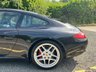 USED 2010 10 PORSCHE 911 3.8 997 Carrera S Coupe 2dr Petrol PDK (240 g/km, 385 bhp)-Price Range Gen 2 Carrera S-Finished In Basalt Black Metallic With Heated Black Leather Upholstery-Sports Exhaust System-Sport Chrono Package Plus-Cruise Control-19 Inch Sport Design Wheels-Sports Seats-Porsche Crest Embossed On Head Restraints-Rear Wiper-Climate Control-Satnav-Bluetooth-Rear Park Assist-Fantastic Example With Top Specification. 