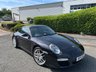 USED 2010 10 PORSCHE 911 3.8 997 Carrera S Coupe 2dr Petrol PDK (240 g/km, 385 bhp)-Price Range Gen 2 Carrera S-Finished In Basalt Black Metallic With Heated Black Leather Upholstery-Sports Exhaust System-Sport Chrono Package Plus-Cruise Control-19 Inch Sport Design Wheels-Sports Seats-Porsche Crest Embossed On Head Restraints-Rear Wiper-Climate Control-Satnav-Bluetooth-Rear Park Assist-Fantastic Example With Top Specification. 