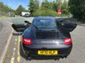 USED 2010 10 PORSCHE 911 3.8 997 Carrera S Coupe 2dr Petrol PDK (240 g/km, 385 bhp)-Price Range Gen 2 Carrera S-Finished In Basalt Black Metallic With Heated Black Leather Upholstery-Sports Exhaust System-Sport Chrono Package Plus-Cruise Control-19 Inch Sport Design Wheels-Sports Seats-Porsche Crest Embossed On Head Restraints-Rear Wiper-Climate Control-Satnav-Bluetooth-Rear Park Assist-Fantastic Example With Top Specification. 