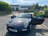 USED 2010 10 PORSCHE 911 3.8 997 Carrera S Coupe 2dr Petrol PDK (240 g/km, 385 bhp)-Price Range Gen 2 Carrera S-Finished In Basalt Black Metallic With Heated Black Leather Upholstery-Sports Exhaust System-Sport Chrono Package Plus-Cruise Control-19 Inch Sport Design Wheels-Sports Seats-Porsche Crest Embossed On Head Restraints-Rear Wiper-Climate Control-Satnav-Bluetooth-Rear Park Assist-Fantastic Example With Top Specification. 