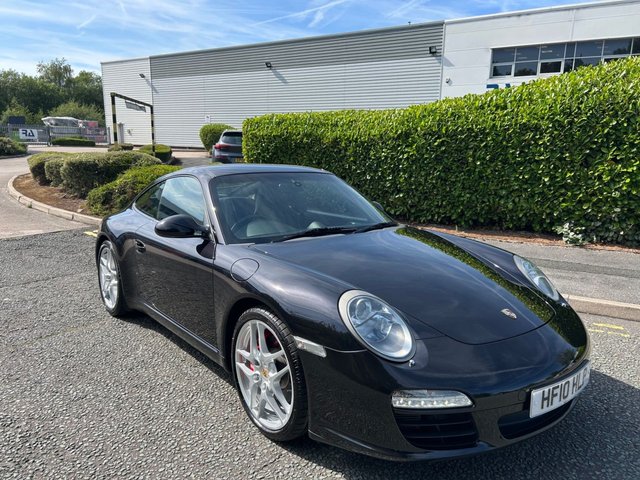 2010 10 Porsche 911 3.8 997 Carrera S Coupe 2dr Petrol PDK (240 g/km, 385 bhp)-Price Range Gen 2 Carrera S-Finished In Basalt Black Metallic With Heated Black Leather Upholstery-Sports Exhaust System-Sport Chrono Package Plus-Cruise Control-19 Inch Sport Design Wheels-Sports Seats-Porsche Crest Embossed On Head Restraints-Rear Wiper-Climate Control-Satnav-Bluetooth-Rear Park Assist-Fantastic Example With Top Specification.