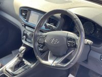 USED 2018 67 HYUNDAI IONIQ 1.6 h-GDi 8.9kWh Premium Hatchback 5dr Petrol Plug-in Hybrid DCT Euro 6 (s/s) (141 ps) THIS CAR COMES WITH 6 MONTHS WARRANTY , BREAKDOWN COVER & RECOVERY++   2 KEYS +  HYBRID MODE+  FRONT AND REAR PARKING SENSORS +  FRONT HEATED SEATS +  AUX +  USB +  LOW MILLAGE +  POWER WINDOWS +  AUTO SIDE MIRRORS +  LED DAY TIME RUNNING HEADLIGHTS +  APPLE/GOOGLE CAR PLAY +  HEATED STEERING WHEEL +  AUTO START/STOP +  PADDLE SHIFTERS +  TRACTION CONTROL +  REVRSING CAMERA +  ADAPTIVE CRUISE CONTROL +  AUTO HEADLIGHTS +  WIFI CONNECTIVITY +  BLUETOOTH +  SAT NAVIGATION +  INFINITY SOUND SYSTEM