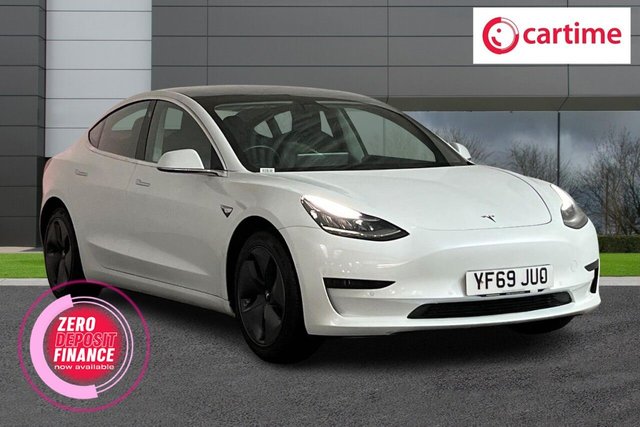 View our Tesla Model 3 Standard Range Plus Saloon 4dr Electric Auto RWD (241 bhp) Panoramic Roof, Tesla Pilot, Full Black Leather, 15-inch touchscreen display, Front and Rear Parking Sensors, Lane Departure Warning, Satellite Navigation