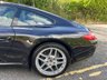 USED 2010 10 PORSCHE 911 3.6 997 Carrera Coupe 2dr Petrol PDK (230 g/km, 345 bhp)-Lovely Generation 2 997 Carrera Coupe Finished In Basalt Black Metallic-3 Former Keepers-Last Keeper Since July 2019-Heated Black Leather Upholstery-Rear Park Assist-Sport Chrono Package Plus-Bluetooth-Satnav-Climate Control-3 Spoke Sports Steering Wheel With Paddle Shift-Universal Audio Interface-19 Inch Carrera Sport Alloy Wheels-Cruise Control-7 Services On File-Pdk Service Completed Jan 2025-What a Car. 