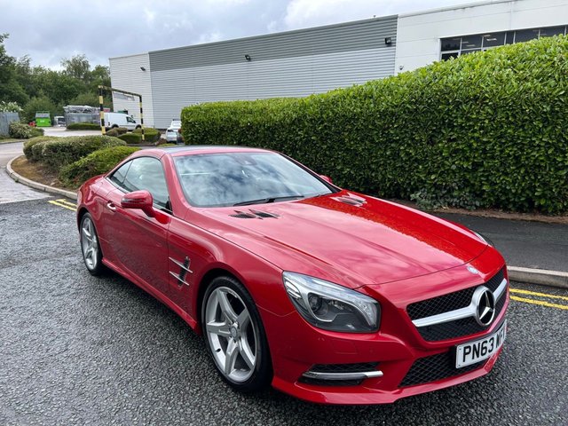 2013 63 Mercedes-Benz Sl 3.5 SL350 V6 BlueEfficiency Convertible 2dr Petrol G-Tronic Euro 5 (s/s) (306 ps)-Factory Extras Worth &pound;3,240-2 Owner Car From New-Last Keeper Since November 2016.Finished In Fire Opal Red With Heated Black Leather Upholstery.Electric Folding Mirrors-Electric Memory Front Seats-Airscarf-19 Inch 5 Spoke Unmarked Alloy Wheels With Matching Pirelli Tyres-Mfsw-Dual Climate Control-Cruise Control-Dab Radio-Bluetooth-Satnav-Sport Steering Wheel-Ambient Lighting Function For Roof-Sports Suspension-Automatic High Beam Control-Magic Vision Control-Ambient Lighting-Very Well Kept Example With Top Specification.