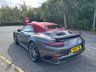 USED 2018 18 PORSCHE 911 3.8T 991 Turbo Convertible 2dr Petrol PDK 4WD Euro 6 (s/s) (540 ps)-2 Owner Car From New-Finished In Agate Grey Metallic-Heated Red Leather Upholstery-Heated Multifunction Steering Wheel-Porsche Dynamic Light System Plus-Rear Lid Air Intake Grilles Painted-Tinted Taillights-Interior & Exterior Package Painted-Leather Interior Package-Climate Control-Dab Radio-Bluetooth-Satnav-Ready To Be Enjoyed. 