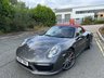 USED 2018 18 PORSCHE 911 3.8T 991 Turbo Convertible 2dr Petrol PDK 4WD Euro 6 (s/s) (540 ps)-2 Owner Car From New-Finished In Agate Grey Metallic-Heated Red Leather Upholstery-Heated Multifunction Steering Wheel-Porsche Dynamic Light System Plus-Rear Lid Air Intake Grilles Painted-Tinted Taillights-Interior & Exterior Package Painted-Leather Interior Package-Climate Control-Dab Radio-Bluetooth-Satnav-Ready To Be Enjoyed. 