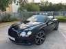 USED 2013 13 BENTLEY CONTINENTAL 6.0 W12 GTC 2d AUTO 567 BHP-2 Former Keepers-Supplied New By Bentley Hampshire-Finished In Beluga-Main Hide In Beluga-Secondary Hide In Beluga-Red Cross & Emblem Stitching-Mulliner Driving Specification-Acoustic Windscreen-Automatic Headlight-Dynamic Range Adjustment-Apple Car Play-One Touch Roof Operation-Piano Interior Finish-Diamond Quilted Hide Seats-Drilled Alloy Sports Foot Pedals-Heated 3 Spoke Hide Trimmed Steering Wheel-Neck Warmer-Wind Deflector-Keyless Entry-Daytime Running Lights-Bluetooth-10 Services On File-9 Bentley Main Dealer-What a Car. 