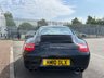 USED 2010 10 PORSCHE 911 3.6 997 Carrera Coupe 2dr Petrol PDK (230 g/km, 345 bhp)-3 Former Keepers-Last Keeper Since Feb 2019-Finished In Basalt Black Metallic-Heated Black Leather Upholstery-Porsche Active Suspension Management-Rear Park Assist-Sport Chrono Package Plus-Bluetooth-Voice Control-Satnav-Climate Control-Pdk 3 Spoke Sports Steering Wheel With Paddle Shift-Universal Audio Interface-Sports Tailpipes-19 Inch Carrera Sport Alloy Wheels-7 Services On File-5 Official Porsche Centre.Fantastic Example Ready To Be Enjoyed. 