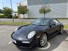 USED 2010 10 PORSCHE 911 3.6 997 Carrera Coupe 2dr Petrol PDK (230 g/km, 345 bhp)-3 Former Keepers-Last Keeper Since Feb 2019-Finished In Basalt Black Metallic-Heated Black Leather Upholstery-Porsche Active Suspension Management-Rear Park Assist-Sport Chrono Package Plus-Bluetooth-Voice Control-Satnav-Climate Control-Pdk 3 Spoke Sports Steering Wheel With Paddle Shift-Universal Audio Interface-Sports Tailpipes-19 Inch Carrera Sport Alloy Wheels-7 Services On File-5 Official Porsche Centre.Fantastic Example Ready To Be Enjoyed. 