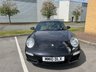 USED 2010 10 PORSCHE 911 3.6 997 Carrera Coupe 2dr Petrol PDK (230 g/km, 345 bhp)-3 Former Keepers-Last Keeper Since Feb 2019-Finished In Basalt Black Metallic-Heated Black Leather Upholstery-Porsche Active Suspension Management-Rear Park Assist-Sport Chrono Package Plus-Bluetooth-Voice Control-Satnav-Climate Control-Pdk 3 Spoke Sports Steering Wheel With Paddle Shift-Universal Audio Interface-Sports Tailpipes-19 Inch Carrera Sport Alloy Wheels-7 Services On File-5 Official Porsche Centre.Fantastic Example Ready To Be Enjoyed. 