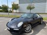 USED 2010 10 PORSCHE 911 3.6 997 Carrera Coupe 2dr Petrol PDK (230 g/km, 345 bhp)-3 Former Keepers-Last Keeper Since Feb 2019-Finished In Basalt Black Metallic-Heated Black Leather Upholstery-Porsche Active Suspension Management-Rear Park Assist-Sport Chrono Package Plus-Bluetooth-Voice Control-Satnav-Climate Control-Pdk 3 Spoke Sports Steering Wheel With Paddle Shift-Universal Audio Interface-Sports Tailpipes-19 Inch Carrera Sport Alloy Wheels-7 Services On File-5 Official Porsche Centre.Fantastic Example Ready To Be Enjoyed. 