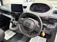 USED 2020 70 PEUGEOT PARTNER 1.5 BlueHDi 950 LWB Crew Van 5 Seater in white, 42,000 miles, 1 owner, ULEZ Euro 6, 5-speed manual, A/C, Bluetooth & more! Final price + VAT @ 20%! With only one previous owner and very low mileage for its age at just 42000 miles, this 2020 Peugeot Partner is a smart buy. This long wheelbase panel van is the BlueHDi 950 Professional derivative, boasting a 1.5L diesel engine and Euro 6 emission class. The Professional trim includes practical features such as offside and twin sliding side doors for easy access, plus rear parking sensors to make maneuvering simple. You'll also appreciate the height-adjustable halogen headlights with automatic