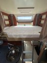 USED 2018 18 FIAT MOBILVETTA MOBILVETTA KEA P65 AUTOMATIC !! Luxurious camping awaits you in this beautiful 4 berth motorhome. Cab features cream leather swivel cab seats, cab blinds, air conditioning, reversing camera, remote control full VB air suspension, moving back to the dining area again comprising cream leather seating, a lovely sociable L-shaped layout would comfortably seat 6.  Nestled away above the dining area is a double bed which glides down at the press of a button.  Moving further back we have a kitchen area with everything you need - 3 burner gas hob, grill, lots of storage and a large family size fridge freezer.  Through the sliding door you have separate shower and toilet, moving though to the end bedroom which can either be used as two single beds or one very large double.  Stairs have handy built in storage and mood lighting, even more storage under each bed.  Could this get any better you might ask? It most certainly can - LARGE CHEQUER PLATED GARAGE accessible on both sides for convenience.    Warranty packages and up to 7 years finance available.   DIMENSIONS - LENGTH - 7.38M, WIDTH - 2.35M, HEIGHT - 2.90M 