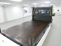 USED 2024 74 FORD E-TRANSIT 350 RWD 68 KWH 184 BHP L3 LONG LEADER PREMIUM DROPSIDE ( AIR CON ) ELECTRIC | AIR CON | LONG | DROPSIDE