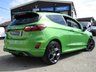 USED 2022 22 FORD FIESTA 1.5T EcoBoost ST-3 Hatchback 3dr Petrol Manual Euro 6 (s/s) (200 ps) Finished in MEAN GREEN with contrasting EBONY PERFORMANCE SPORTS  LEATHER interior trim. It is impossible to ignore that this is one seriously fun car. If you are after some old-school hot hatch fun, the ST is hard to beat.  Features include PAN ROOF, NAV, Bang and Olufsen Speakers, Rear View Camera, Cruise Control, Climate, Heated Seats, DAB, B/Tooth, LED day Lights, 2 Keys and much more.