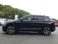 USED 2019 19 VOLKSWAGEN TIGUAN 1.5 TSI EVO R-Line 5d DSG 150 S/S UPGRADE PARK ASSIST WITH AREA VIEW CAMERA, UPGRADE KEYLESS ENTRY START & ELECTRIC TAILGATE, PANORAMIC GLASS SUNROOF, VIRTUAL COCKPIT, SAT NAV, APP CONNECT FOR APPLE CAR PLAY / ANDROID AUTO, HEATED FRONT SEATS, ADAPTIVE CRUISE CONTROL, LANE ASSIST WITH ADAPTIVE LANE GUIDANCE, FRONT ASSIST, DYNAMIC ROAD SIGN DISPLAY, DAB RADIO, BLUETOOTH, FRONT & REAR PARKING SENSORS WITH DISPLAY, 20 INCH ALLOY WHEELS,  AUTO LIGHTS + WIPERS, AUTO HOLD, ELECTRIC FOLDING MIRRORS, SPACE SAVER SPARE, SERVICE HISTORY