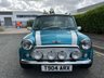 USED 1999 T ROVER MINI 1.3 Cooper Saloon 2dr Petrol Manual (164 g/km, 62 bhp)-Finished In Rare Hawaiian blue with a contrasting white roof and bonnet stripes-Rare Hawaiian Blue Leather Upholstery-Recent new RC40 exhaust, fan belt, heater matrix and recommended Yokohama A539 tyres-Just Over 41600 miles from new and cherished by a Mini enthusiast for the past eleven years. 