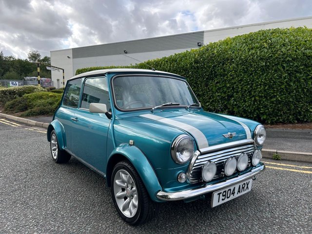 1999 T Rover MINI 1.3 Cooper Saloon 2dr Petrol Manual (164 g/km, 62 bhp)-Finished In Rare Hawaiian blue with a contrasting white roof and bonnet stripes-Rare Hawaiian Blue Leather Upholstery-Recent new RC40 exhaust, fan belt, heater matrix and recommended Yokohama A539 tyres-Just Over 41600 miles from new and cherished by a Mini enthusiast for the past eleven years.