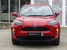 USED 2022 72 TOYOTA YARIS CROSS 1.5 VVT-h Icon SUV 5dr Petrol Hybrid E-CVT Euro 6 (s/s) (116 ps) Finished in SCARLET FLARE RED with Contrasting Dark Trim. This Yaris is a compact, self-charging hybrid SUV designed for all environments. It seamlessly blends electric and petrol power for efficiency, with no need to plug it in. Features include Low Mileage, Apple Play Nav, Rear View Camera, DAB Radio, Alloys, B/Tooth, Cruise Control and Balance of Toyota 5 Year Warranty (8 Years on EV Battery). Toyota Dealer serviced at 3421 miles and at 7010 miles.