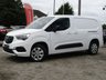 USED 2021 71 VAUXHALL COMBO 1.5 Turbo D 2300 Elite Panel Van 4dr Diesel Manual L2 H1 Euro 6 (100 ps) Very Clean 3 seater  LONG WHEEL BASE TWIN SLIDING DOOR COMBO ELITE TOP OF THE RANGE. This practical small van has a one-tonne payload and the cabin is airy, comfortable and modern. Features include Fixed full height Bulk Head, Alloy Wheels, Rear Park Sensors, DAB Radio, B/Tooth, Cruise Control , SAT NAV, APPLE CAR PLAY, REAR REVERSING CAMERA , COMES WITH 2 KEYS & SERVICED AT THE FOLLOWING MILES, 31274 MILES, 51279 MILES, 75301 MILES
