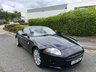 USED 2007 07 JAGUAR XK 4.2 V8 Coupe 2dr Petrol Auto Euro 4 (300 ps)-Great Low Mileage Example-Finished In Ebony Black Metallic With Heated Beige Leather Upholstery-Mfsw-Dual Climate Control-Cruise Control-Satnav-Electric Memory Front Seats-Bluetooth-Walnut Dash-Alpine Sound-Just Superb. 