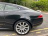 USED 2007 07 JAGUAR XK 4.2 V8 Coupe 2dr Petrol Auto Euro 4 (300 ps)-Great Low Mileage Example-Finished In Ebony Black Metallic With Heated Beige Leather Upholstery-Mfsw-Dual Climate Control-Cruise Control-Satnav-Electric Memory Front Seats-Bluetooth-Walnut Dash-Alpine Sound-Just Superb. 
