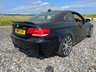 USED 2008 08 BMW M3 4.0 iV8 Coupe 2dr Petrol Manual Up for sale is this stunning BMW E92 M3 with just 83,000 miles and the rare 6-speed manual gearbox, making it a true driver's car. Finished in sleek black with a striking red leather interior, it features 19” lightweight M alloys wrapped in brand new Michelin Pilot Sport 5 tyres. Visually enhanced with a carbon front splitter, carbon lip spoiler, M3-style bonnet, and carbon roof, it has real presence on the road. The 420bhp 4.0L V8 delivers incredible performance, amplified by a Peformance exhaust for a deeper, sportier tone.  Inside, it comes well-equipped with AUX connectivity, automatic headlights with rain sensors, electric damper control, climate and cruise control, and rear parking sensors, offering both comfort and practicality. This is a beautifully maintained, tastefully upgraded example of a legendary performance car—ready to be enjoyed by its next enthusiast owner. 