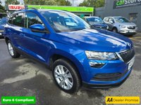USED 2020 20 SKODA KAROQ 1.0 TSI SE SUV, 42,100 miles, 3 owners, service history, Euro 6 ULEZ, 6-Speed, Air Conditioning, Bluetooth, DAB, Rear Sensors and much much more! This 2020 Skoda Karoq TSI SE offers excellent value with its MOT valid until July 2026, providing peace of mind for the coming years.  This Euro 6 compliant model is powered by an efficient 1.0 litre petrol engine, making it a sensible choice for everyday driving.  Inside, you'll find a comfortable and practical cabin equipped with a DAB digital radio and Bluetooth connectivity for your entertainment and communication needs.  Convenience is further enhanced by the light and rain sensor system, w