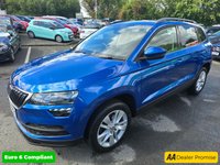 USED 2020 20 SKODA KAROQ 1.0 TSI SE SUV, 42,100 miles, 3 owners, service history, Euro 6 ULEZ, 6-Speed, Air Conditioning, Bluetooth, DAB, Rear Sensors and much much more! This 2020 Skoda Karoq TSI SE offers excellent value with its MOT valid until July 2026, providing peace of mind for the coming years.  This Euro 6 compliant model is powered by an efficient 1.0 litre petrol engine, making it a sensible choice for everyday driving.  Inside, you'll find a comfortable and practical cabin equipped with a DAB digital radio and Bluetooth connectivity for your entertainment and communication needs.  Convenience is further enhanced by the light and rain sensor system, w