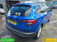 USED 2020 20 SKODA KAROQ 1.0 TSI SE SUV, 42,100 miles, 3 owners, service history, Euro 6 ULEZ, 6-Speed, Air Conditioning, Bluetooth, DAB, Rear Sensors and much much more! This 2020 Skoda Karoq TSI SE offers excellent value with its MOT valid until July 2026, providing peace of mind for the coming years.  This Euro 6 compliant model is powered by an efficient 1.0 litre petrol engine, making it a sensible choice for everyday driving.  Inside, you'll find a comfortable and practical cabin equipped with a DAB digital radio and Bluetooth connectivity for your entertainment and communication needs.  Convenience is further enhanced by the light and rain sensor system, w