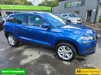 USED 2020 20 SKODA KAROQ 1.0 TSI SE SUV, 42,100 miles, 3 owners, service history, Euro 6 ULEZ, 6-Speed, Air Conditioning, Bluetooth, DAB, Rear Sensors and much much more! This 2020 Skoda Karoq TSI SE offers excellent value with its MOT valid until July 2026, providing peace of mind for the coming years.  This Euro 6 compliant model is powered by an efficient 1.0 litre petrol engine, making it a sensible choice for everyday driving.  Inside, you'll find a comfortable and practical cabin equipped with a DAB digital radio and Bluetooth connectivity for your entertainment and communication needs.  Convenience is further enhanced by the light and rain sensor system, w