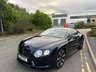 USED 2014 64 BENTLEY CONTINENTAL 4.0 V8 GT S Coupe 2dr Petrol  AUTO  521 BHP-2 Former Keepers-Last Keeper Since June 2022-Finished In Dark Sapphire Metallic-Main Hide In Linen & Secondary Hide In Imperial Blue-Seat Belts To Match Secondary Hide-Mulliner Driving Specification-Embroidered Bentley Emblems-Acoustic Windscreen & Side Glazing-Automatic Headlight Dynamic Range Adjustment-Quad Exhaust Finishers-Beluga Gloss Factory Fitted Exterior Lower Body Styling Specification-Burr Walnut Interior Trim-Diamond Quilted Hide Seats-Dual Climate Control-Mfsw-Cruise Control-Dab Radio-Bluetooth-Satnav-Ventilated Front Seats With Massage Function-Bentley Tracking Gps System-Keyless Entry-Heated Front Seats-Ipod Interface-Lumbar Support To Front Seats-Power Opening Boot-Rear View Camera-Telephone Voice Control-21 Inch Seven Spoke Alloy Wheels-Electronic Sports Suspension-Four Wheel Drive-Sports Exhaust-Fantastic Opportunity To Buy a Special Car. 
