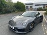 USED 2017 17 PORSCHE 911 3.8T 991 Turbo S Coupe 2dr Petrol PDK 4WD Euro 6 (s/s) (580 ps)-1 Owner From New-Finished In Agate Grey Metallic-Luxor Beige Leather Upholstery-Heated Front Seats-Passenger Footwell Storage Net-Garage Door Opener-Light Design Package-Extended Interior Package Dashboard Trim In Leather-Door Sill Guards In Carbon-Side Skirts Painted-Rear Side Air Intakes Painted-Instrument Dials In White-Sports Chrono-Multifunction & Heated Steering Wheel In Carbon-Sun Visors In Leather-Factory Privacy Glass-Porsche Crest Embossed On Headrests-Centre Armrest With Logo-Full Opc Service History-Magnificent 1 Owner 991 Turbo S-Cherished By Its Only Custodian. 