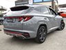 USED 2022 71 HYUNDAI TUCSON 1.6 T-GDi MHEV N Line SUV 5dr Petrol Hybrid DCT Euro 6 (s/s) (150 ps) Finished in SHADOW GREY MET with contrasting HEATED ALCANTARA TRIM. This Tucson ticks all of the family car boxes, with practicality and a good interior its strongest points. This Premium trim brings plenty of high spec and is the best option for a well-valued Tucson. Features include BALANCE OF 5 YEARS WARRANTY. Sat Nav, Heated seats, Reverse Camera, DAB Radio, B/Tooth, LED Run Lights, 19" Alloys and much more. Dealer serviced at 23305 miles, 42764 miles, and at 54360 miles.