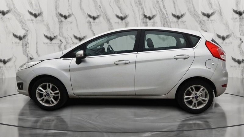 2015 Ford Fiesta in silver — photo 8 of 14