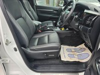 USED 2022 22 TOYOTA HI-LUX 2.8 D-4D Invincible X Double Cab, 85,000 miles, 1 owner, ULEZ Euro 6, Automatic, Air Conditioning, Sat Nav, Rear Camera, Final price +VAT @20%! This 2022 Toyota Hilux D-4D Invincible X presents a superb ownership proposition, having been meticulously maintained by just one owner from new. This robust Four Wheel Drive pickup is powered by an efficient 2.8 litre Euro 6 diesel engine, ensuring capable performance for any task. The Invincible X trim level comes equipped with a host of desirable features, including bright LED headlights for enhanced visibility, front and rear parking sensors, and a rear view camera to aid manoeuvring. Inside