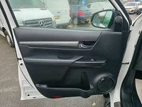 USED 2022 22 TOYOTA HI-LUX 2.8 D-4D Invincible X Double Cab, 85,000 miles, 1 owner, ULEZ Euro 6, Automatic, Air Conditioning, Sat Nav, Rear Camera, Final price +VAT @20%! This 2022 Toyota Hilux D-4D Invincible X presents a superb ownership proposition, having been meticulously maintained by just one owner from new. This robust Four Wheel Drive pickup is powered by an efficient 2.8 litre Euro 6 diesel engine, ensuring capable performance for any task. The Invincible X trim level comes equipped with a host of desirable features, including bright LED headlights for enhanced visibility, front and rear parking sensors, and a rear view camera to aid manoeuvring. Inside