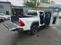 USED 2022 22 TOYOTA HI-LUX 2.8 D-4D Invincible X Double Cab, 85,000 miles, 1 owner, ULEZ Euro 6, Automatic, Air Conditioning, Sat Nav, Rear Camera, Final price +VAT @20%! This 2022 Toyota Hilux D-4D Invincible X presents a superb ownership proposition, having been meticulously maintained by just one owner from new. This robust Four Wheel Drive pickup is powered by an efficient 2.8 litre Euro 6 diesel engine, ensuring capable performance for any task. The Invincible X trim level comes equipped with a host of desirable features, including bright LED headlights for enhanced visibility, front and rear parking sensors, and a rear view camera to aid manoeuvring. Inside