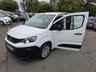 USED 2021 21 PEUGEOT PARTNER 1.5 BlueHDi LWB Crew Van, 69,999 miles, 1 owner, Full Service History, Euro 6, 5 seater, Sat Nav, Cruise, Air Con, Bluetooth +VAT @20%! This 2021 Peugeot Partner is a superb example, having been owned by just one careful keeper since new. As a 1.5 BlueHDi 950 Professional Long Panel Van LWB Euro 6 model, it combines a robust 1.5 litre diesel engine with the practicalities of a long wheelbase and the efficiency of Euro 6 emissions. The Professional trim level ensures a well equipped interior, ready for any task. With its MOT valid until February 2026, this van offers peace of mind for the road ahead.  The Peugeot Partner stands o